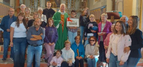Per la Feta di Rousson a Oyace è stato omaggiato il parroco don Ivano Reboulaz